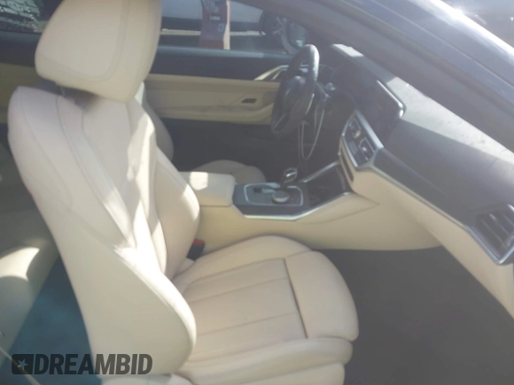 2022 BMW 4 Series 430i with VIN WBA53AP09NCJ24098, listed as a IAAI auction lot 41395007 with 34,062 mi miles and . Bid and sale history available at carsss.com. Image 5.