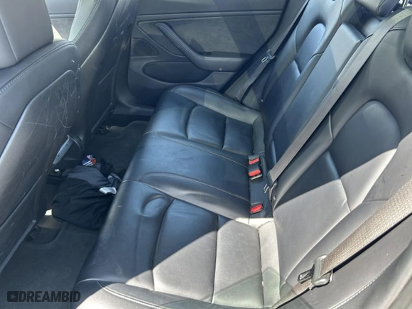 2018 Tesla Model 3 Long Range Battery with VIN 5YJ3E1EA8JF026497, listed as a IAAI auction lot 41987950 with 72,373 mi miles. Bid and sale history available at carsss.com. Image 8.