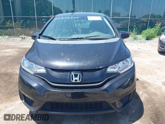 2015 Honda Fit LX z VIN 3HGGK5H56FM712266, wystawiony jako IAAI lot #42378228 z przebiegiem 140 423 mil mil oraz . Historia ofert i sprzedaży dostępna na DreamBid. Obrazek 12.