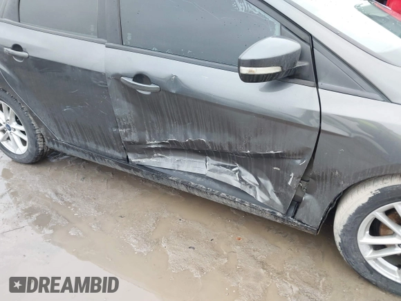 2015 Ford Focus SE with VIN 1FADP3K26FL383355, listed as a IAAI auction lot 41520459 with 142,111 mi miles and . Bid and sale history available at DreamBid. Image 6.