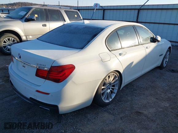 2013 BMW 7 Series 740i with VIN WBAYA6C54DD143796, listed as a IAAI auction lot 41433835 with 1 mi miles. Bid and sale history available at carsss.com. Image 4.