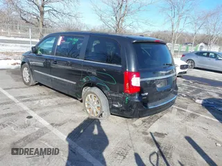 2016 Chrysler Town & Country Touring with VIN 2C4RC1BG7GR231704, listed as a IAAI auction lot 41306140 with 165,890 mi miles. Bid and sale history available at carsss.com. Image 3.