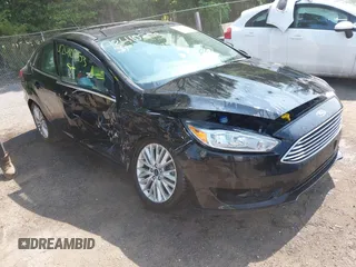 2018 Ford Focus Titanium z VIN 1FADP3J22JL220986, wystawiony jako IAAI lot #42410253 z przebiegiem 40 791 mil mil oraz . Historia ofert i sprzedaży dostępna na DreamBid. Obrazek 1.