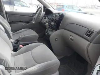 2004 Toyota Sienna CE with VIN 5TDZA23C04S032956, listed as a IAAI auction lot 42121153 with 218,908 mi miles. Bid and sale history available at carsss.com. Image 5.