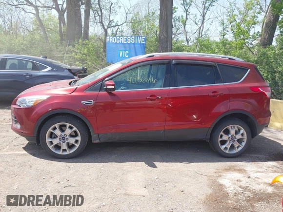2015 Ford Escape Titanium with VIN 1FMCU0J92FUA38616, listed as a IAAI auction lot 42136816 with 131,941 mi miles and . Bid and sale history available at DreamBid. Image 14.