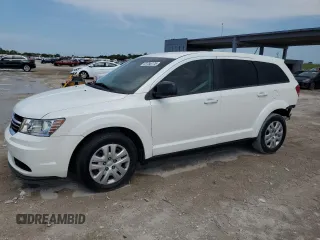 2014 Dodge Journey SE with VIN 3C4PDCAB9ET170324, listed as a Copart auction lot 58768775 with 132,551 mi miles and Salvage title. Bid and sale history available at DreamBid. Image 1.