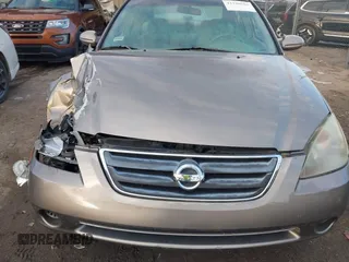 2004 Nissan Altima S with VIN 1N4AL11D44C168527, listed as a IAAI auction lot 41320562 with 94,803 mi miles. Bid and sale history available at carsss.com. Image 6.