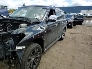 2017 Nissan Armada Platinum z VIN JN8AY2NCXH9504904, wystawiony jako Copart lot #58023935 z przebiegiem Nie podano mil oraz Szkoda całkowita • Salvage title. Historia ofert i sprzedaży dostępna na DreamBid. Obrazek 13.