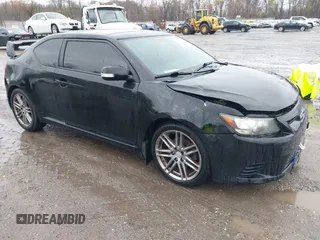 2013 Scion tC with VIN JTKJF5C79D3051664, listed as a IAAI auction lot 42027579 with 211,322 mi miles. Bid and sale history available at carsss.com. Image 1.