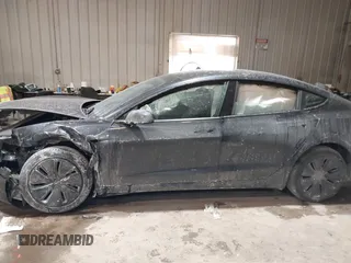 2025 Tesla Model 3 Long Range with VIN 5YJ3E1EA4SF913869, listed as a IAAI auction lot 41416608 with 1,141 mi miles and . Bid and sale history available at DreamBid. Image 14.