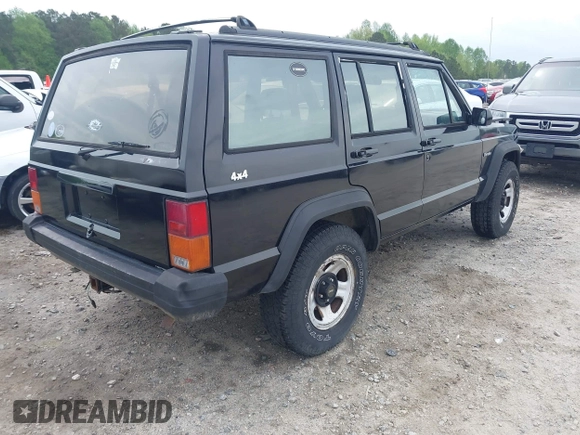 1994 Jeep Cherokee Sport with VIN 1J4FJ68S1RL160023, listed as a IAAI auction lot 41968610 with 255,978 mi miles. Bid and sale history available at carsss.com. Image 4.