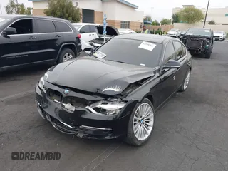 2014 BMW 3 Series 328i xDrive with VIN WBA3B5C51EP543364, listed as a IAAI auction lot 42138365 with 145,243 mi miles and . Bid and sale history available at DreamBid. Image 23.
