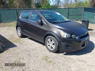 2014 Chevrolet Sonic LT with VIN 1G1JC6SB6E4210561, listed as a IAAI auction lot 42073197 with 100,945 mi miles. Bid and sale history available at carsss.com. Image 1.