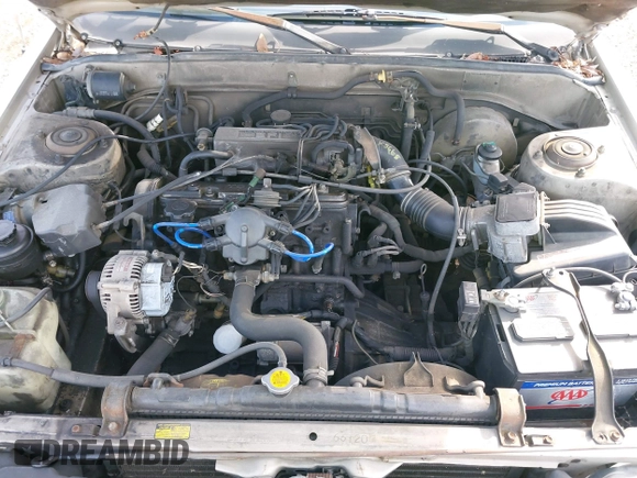 1985 Toyota Camry z VIN JT2SV16E9F0351378, wystawiony jako IAAI lot #41605627 z przebiegiem 192 476 mil mil oraz . Historia ofert i sprzedaży dostępna na DreamBid. Obrazek 10.