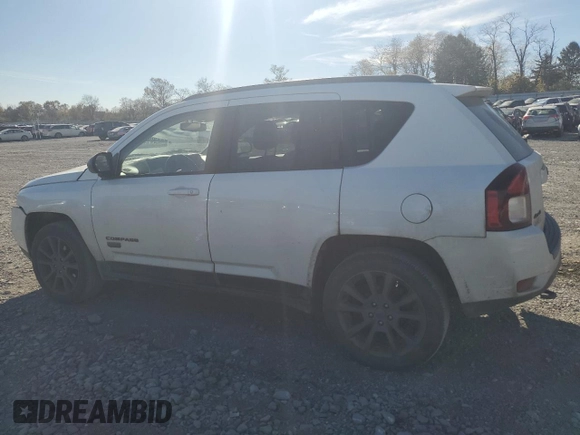 2017 Jeep Compass 75th Anniversary Edition with VIN 1C4NJDBBXHD168127, listed as a Copart auction lot 77858624 with 82,702 mi miles and Salvage Title. Bid and sale history available at carsss.com. Image 2.