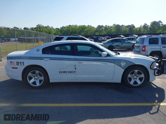 2014 Dodge Charger Police with VIN 2C3CDXAT8EH348719, listed as a IAAI auction lot 42026437 with 140,573 mi miles and . Bid and sale history available at DreamBid. Image 13.