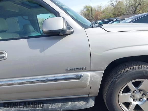 2005 GMC Yukon SLT with VIN 1GKEK13T15J118270, listed as a IAAI auction lot 41937413 with 218,057 mi miles. Bid and sale history available at carsss.com. Image 6.