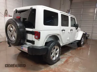 2014 Jeep Wrangler Unlimited Sahara with VIN 1C4BJWEG1EL326605, listed as a IAAI auction lot 41325037 with 135,824 mi miles. Bid and sale history available at carsss.com. Image 4.