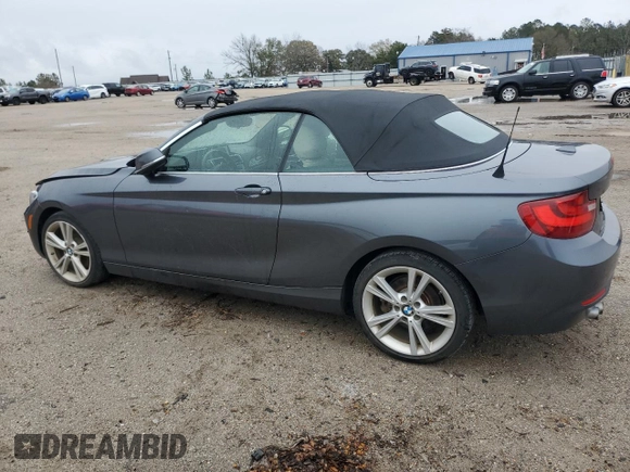 2015 BMW 2 Series 228i with VIN WBA1K5C57FV474037, listed as a Copart auction lot 87857635 with 91,333 mi miles and Salvage title. Bid and sale history available at DreamBid. Image 2.