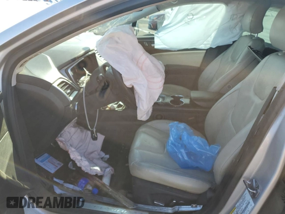 2016 Ford Fusion Titanium Hybrid with VIN 3FA6P0RU2GR114027, listed as a Copart auction lot 85223884 with Not provided miles and Salvage title. Bid and sale history available at DreamBid. Image 7.