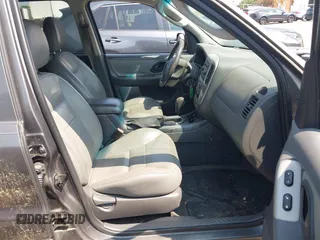 2005 Ford Escape XLT with VIN 1FMYU93155KA87661, listed as a IAAI auction lot 42491447 with 142,287 mi miles and . Bid and sale history available at DreamBid. Image 5.