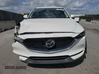2019 Mazda CX-5 Touring with VIN JM3KFACM5K0693931, listed as a Copart auction lot 51599685 with 51,907 mi miles and Non Repairable. Bid and sale history available at carsss.com. Image 5.