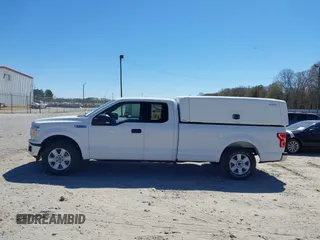 2018 Ford F-150 XL with VIN 1FTFX1C57JKF08037, listed as a IAAI auction lot 41863806 with 195,725 mi miles and . Bid and sale history available at DreamBid. Image 14.