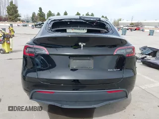 2023 Tesla Model Y Long Range with VIN 7SAYGDEE1PF748426, listed as a IAAI auction lot 41839308 with 26,633 mi miles and . Bid and sale history available at carsss.com. Image 16.
