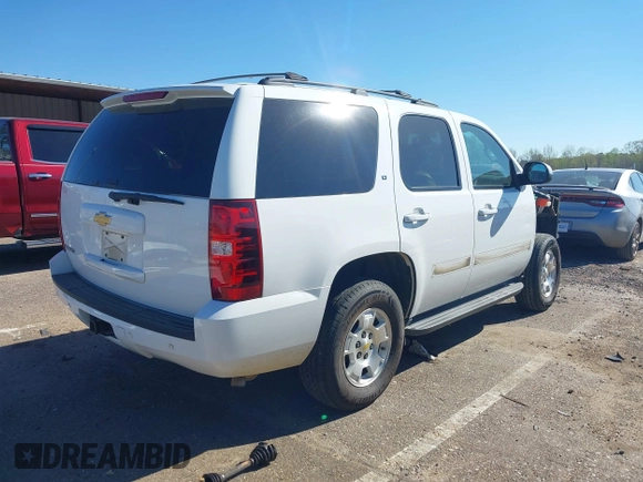 2013 Chevrolet Tahoe LT with VIN 1GNSCBE07DR256584, listed as a IAAI auction lot 39068684 with 139,897 mi miles and . Bid and sale history available at DreamBid. Image 4.