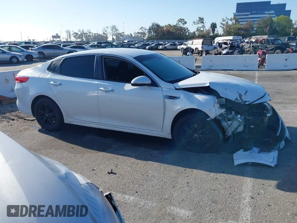 2016 Kia Optima LX with VIN 5XXGT4L33GG014082, listed as a IAAI auction lot 41870030 with 137,849 mi miles and . Bid and sale history available at DreamBid. Image 12.
