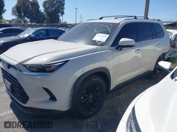 2024 Toyota Highlander XLE with VIN 5TDAAAA59RS007427, listed as a IAAI auction lot 42272224 with 14,260 mi miles and . Bid and sale history available at DreamBid. Image 2.