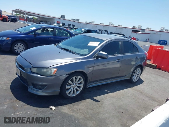 2010 Mitsubishi Lancer GTS z VIN JA32X8HW6AU005689, wystawiony jako IAAI lot #42467923 z przebiegiem 166 508 mil mil oraz . Historia ofert i sprzedaży dostępna na DreamBid. Obrazek 12.