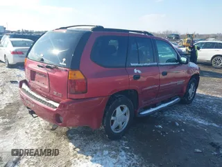 2003 GMC Envoy SLE with VIN 1GKDT13S732131869, listed as a IAAI auction lot 41422135 with 163,193 mi miles. Bid and sale history available at carsss.com. Image 4.