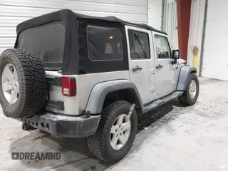 2008 Jeep Wrangler Unlimited X with VIN 1J4GA391X8L647311, listed as a IAAI auction lot 41499620 with 140,601 mi miles and . Bid and sale history available at carsss.com. Image 4.