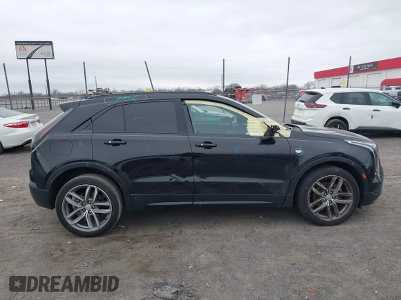 2019 Cadillac XT4 FWD Sport z VIN 1GYFZER49KF178096, wystawiony jako IAAI lot #41611247 z przebiegiem 37 971 mil mil oraz . Historia ofert i sprzedaży dostępna na DreamBid. Obrazek 14.