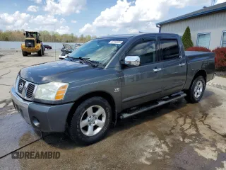 2004 Nissan Titan LE with VIN 1N6AA07AX4N559111, listed as a Copart auction lot 52168395 with 222,757 mi miles and Salvage title. Bid and sale history available at DreamBid. Image 1.