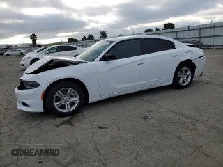 2023 Dodge Charger SXT with VIN 2C3CDXBG5PH703978, listed as a Copart auction lot 50657745 with 7,198 mi miles and Salvage Title. Bid and sale history available at carsss.com. Image 1.