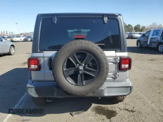 2019 Jeep Wrangler Unlimited Sport with VIN 1C4HJXDG8KW632213, listed as a Copart auction lot 42623815 with 121,014 mi miles and Salvage title. Bid and sale history available at DreamBid. Image 6.
