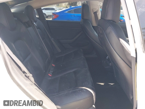 2018 Tesla Model 3 Long Range Battery with VIN 5YJ3E1EAXJF108781, listed as a IAAI auction lot 41962628 with 61,208 mi miles and . Bid and sale history available at DreamBid. Image 8.
