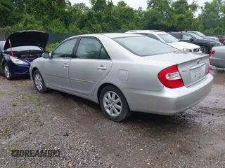 2002 Toyota Camry XLE z VIN JTDBF30K420083381, wystawiony jako IAAI lot #42368073 z przebiegiem 148 746 mil mil oraz . Historia ofert i sprzedaży dostępna na DreamBid. Obrazek 3.