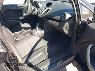 2011 Ford Fiesta SE with VIN 3FADP4BJ7BM135864, listed as a IAAI auction lot 42134479 with 118,573 mi miles. Bid and sale history available at carsss.com. Image 5.