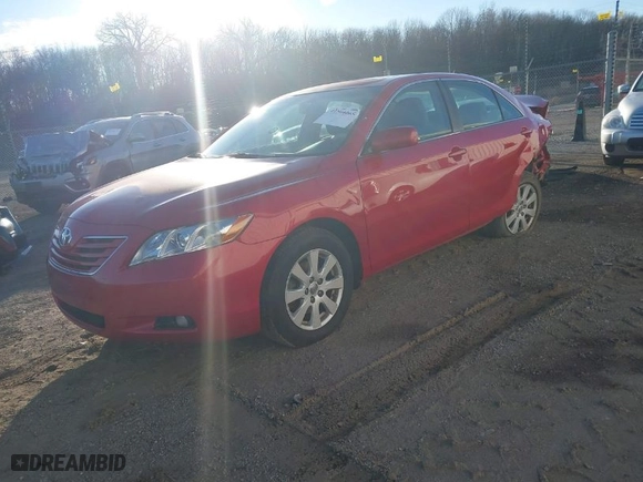 2007 Toyota Camry CE with VIN 4T1BE46K67U010279, listed as a IAAI auction lot 41504065 with 297,916 mi miles. Bid and sale history available at carsss.com. Image 2.