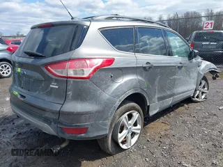 2013 Ford Escape SE with VIN 1FMCU9GX6DUA83081, listed as a IAAI auction lot 41991167 with 106,793 mi miles and . Bid and sale history available at DreamBid. Image 4.