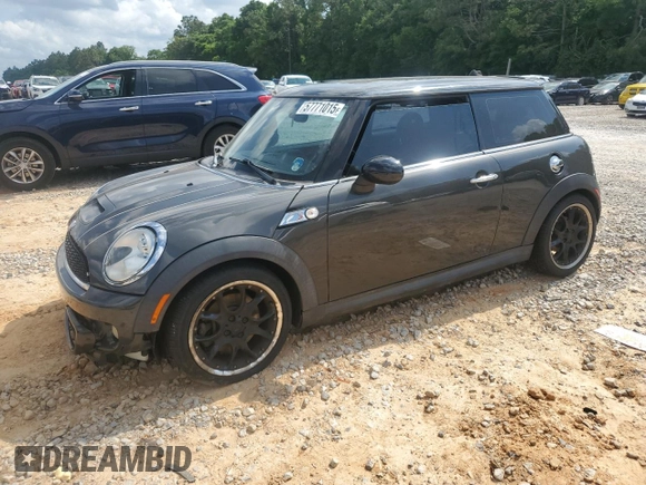 2012 MINI Hardtop S with VIN WMWSV3C50CTY18637, listed as a Copart auction lot 57771015 with 103,402 mi miles and Salvage title. Bid and sale history available at DreamBid. Image 1.