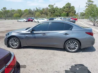 2018 Infiniti Q50 Luxe with VIN JN1EV7AP4JM590048, listed as a IAAI auction lot 41863410 with 55,727 mi miles and . Bid and sale history available at carsss.com. Image 14.