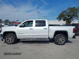 2017 GMC Sierra 1500 SLT with VIN 3GTP1NECXHG423591, listed as a IAAI auction lot 41509177 with 100,071 mi miles and . Bid and sale history available at DreamBid. Image 14.