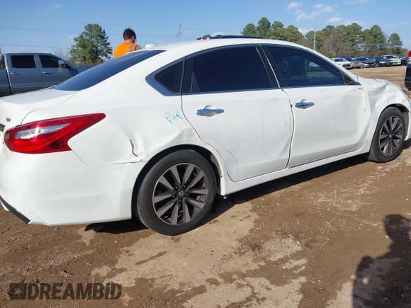 2018 Nissan Altima SV with VIN 1N4AL3APXJC167187, listed as a IAAI auction lot 41725188 with 173,377 mi miles and . Bid and sale history available at DreamBid. Image 4.