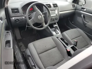 2009 Volkswagen Rabbit S with VIN WVWBB71K89W037593, listed as a Copart auction lot 74941614 with 51,645 mi miles and Salvage title. Bid and sale history available at DreamBid. Image 8.