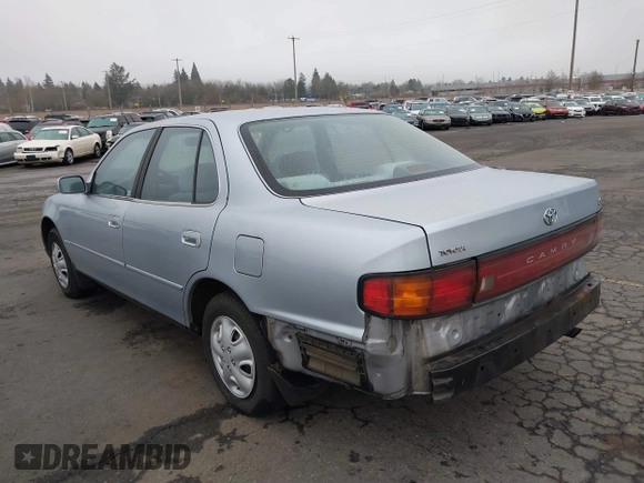 1994 Toyota Camry LE with VIN JT2SK12E2R0207688, listed as a IAAI auction lot 41323827 with 162,680 mi miles. Bid and sale history available at carsss.com. Image 3.