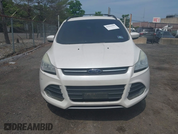 2013 Ford Escape SE z VIN 1FMCU9GXXDUD82847, wystawiony jako IAAI lot #42436360 z przebiegiem 142 071 mil mil oraz . Historia ofert i sprzedaży dostępna na DreamBid. Obrazek 11.
